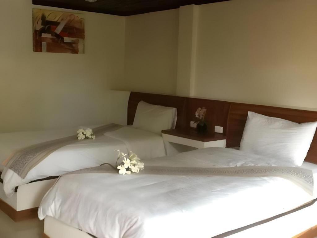 Phutawanchomdow Hotel Tha Li Buitenkant foto
