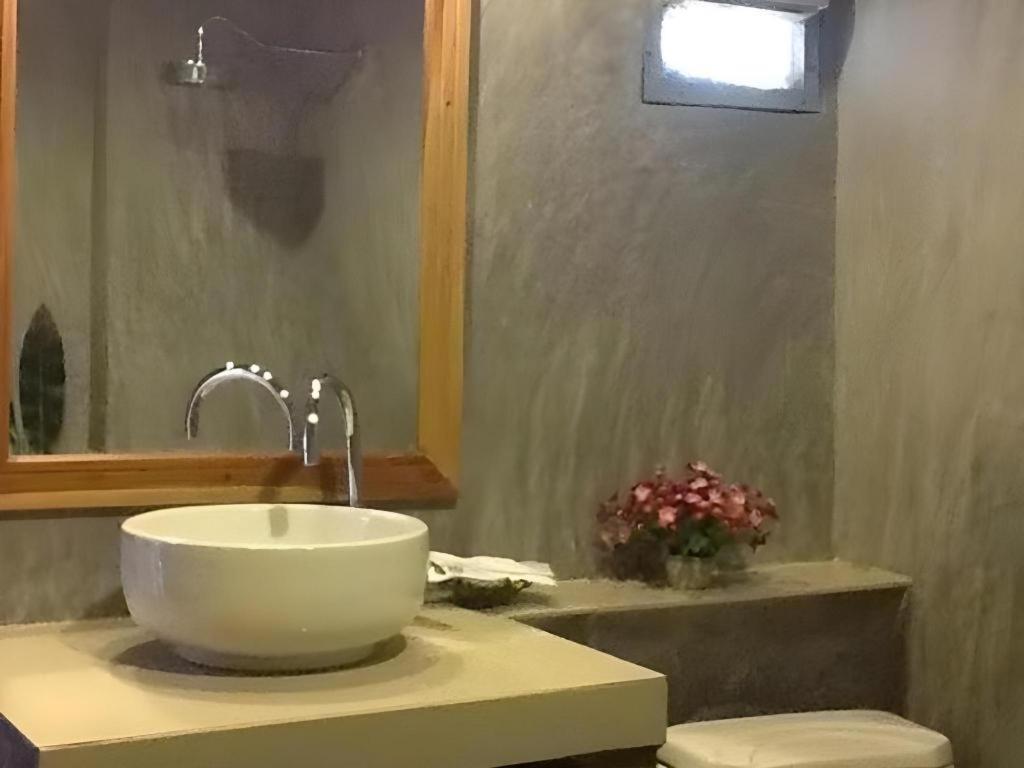 Phutawanchomdow Hotel Tha Li Buitenkant foto